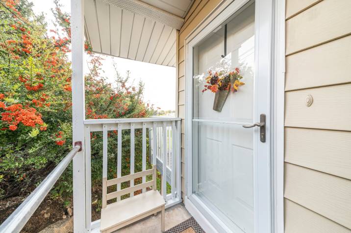 glass storm door installed on the patio