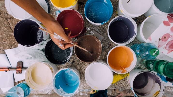 different buckets of paint colors