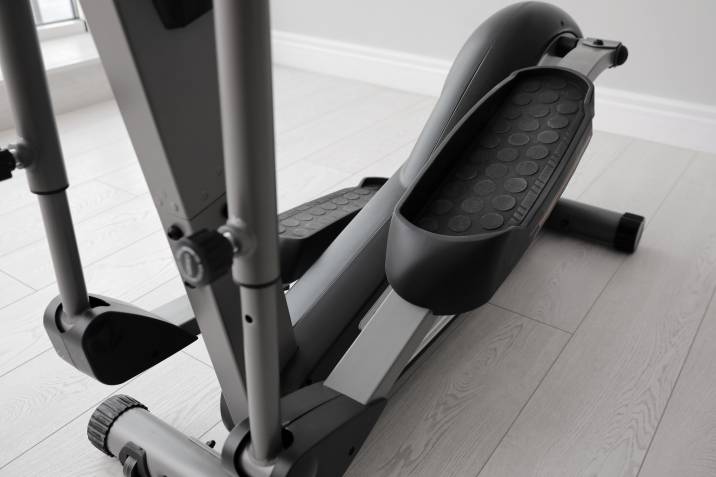closeup of elliptical machine cross trainer on the floor