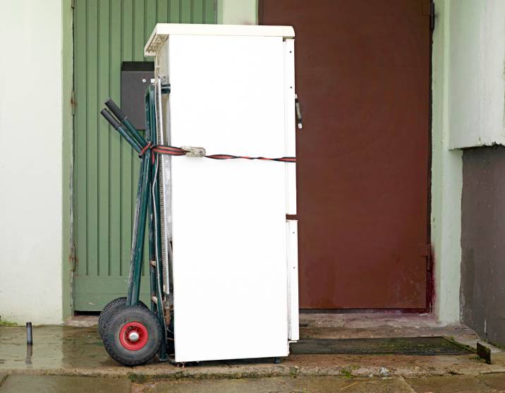 a refrigerator ready to be moved