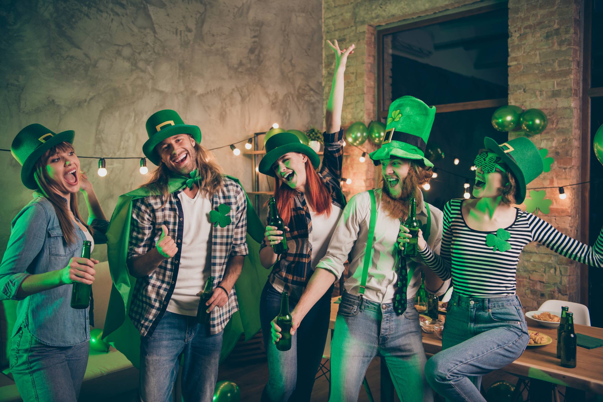 five friends having a St. Patrick's Day party