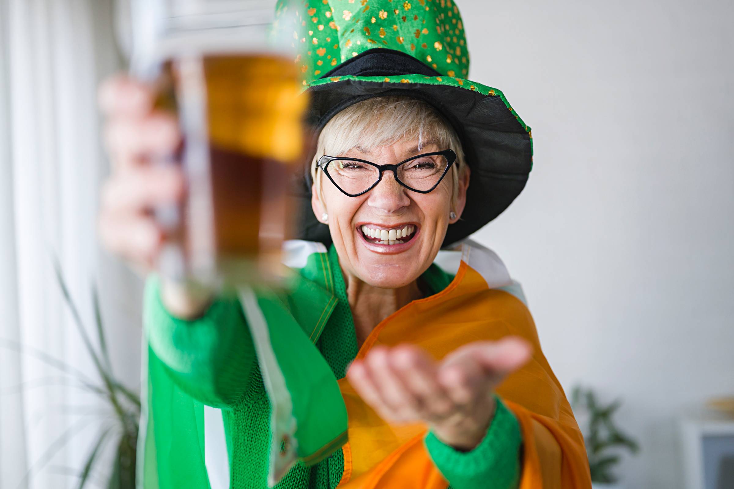 a lady wearing Irish symbols for St. Patrick's Day