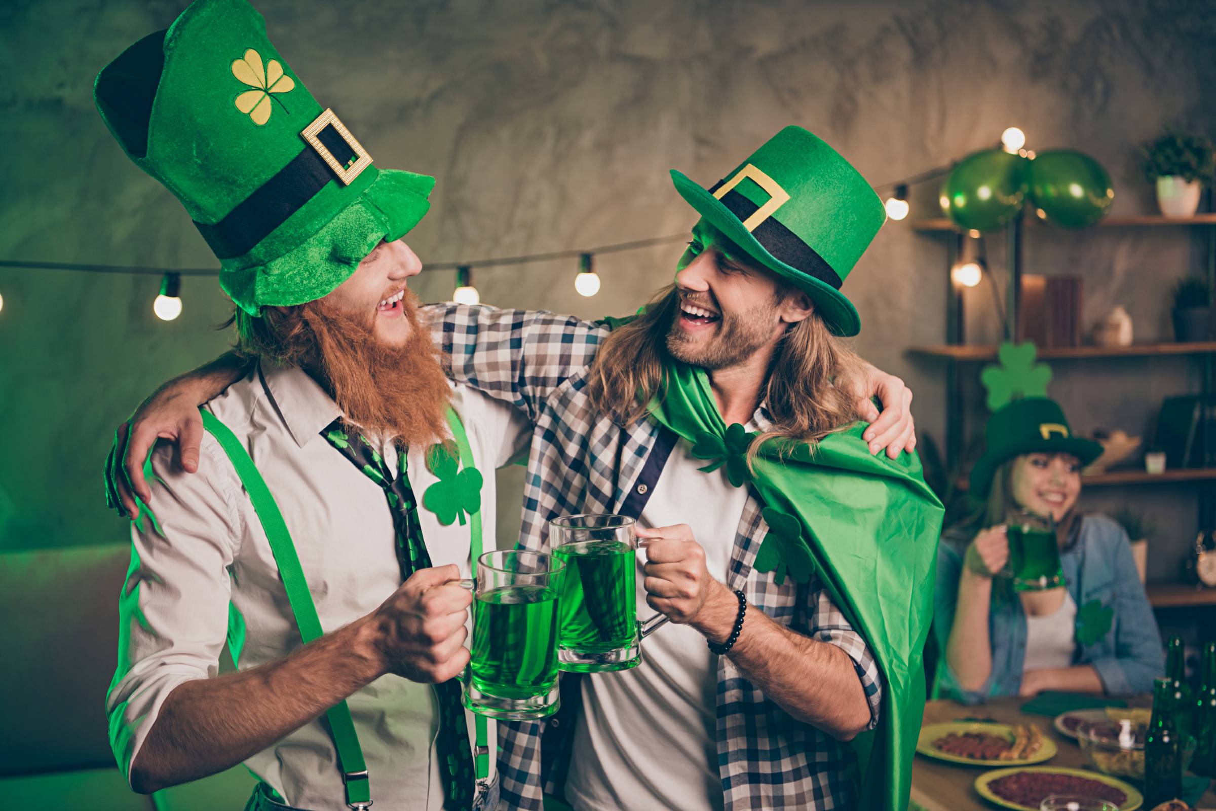 two guys dressed in costumes for St. Patrick's Day