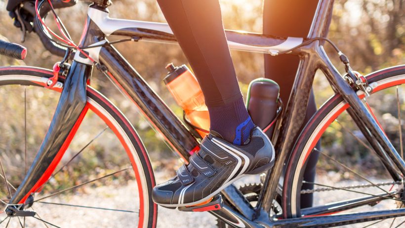 a man ready for riding his gravel bike or road bike with accessories and mounting options