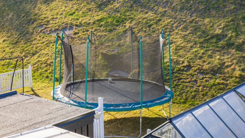 rectangle vs round trampoline: top view of trampoline with safety net