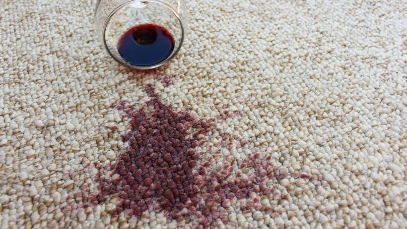 Steam cleaning carpets vs shampooing - a spilled wine stain on a carpet