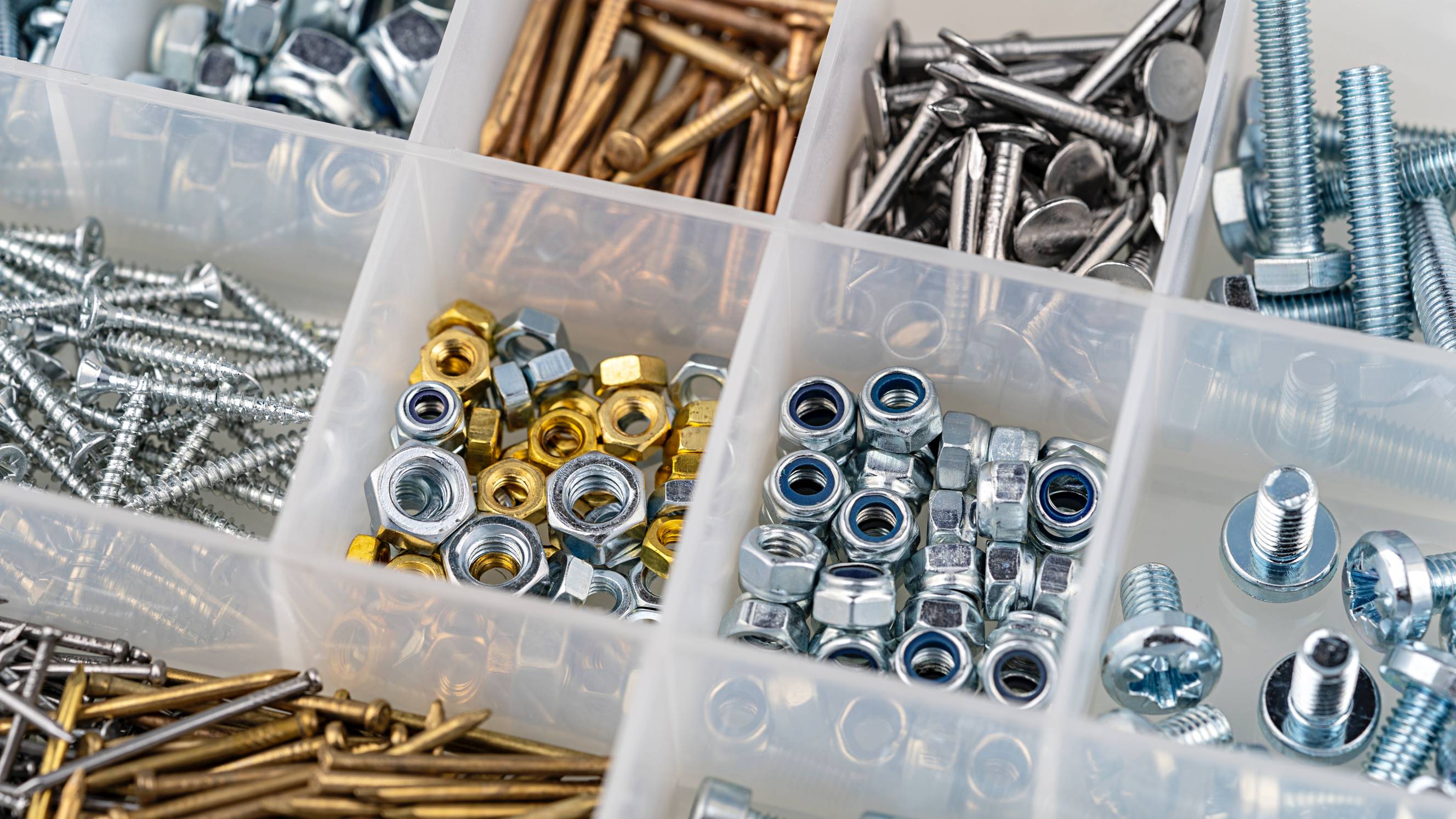 a toolbox full of screws and bolts