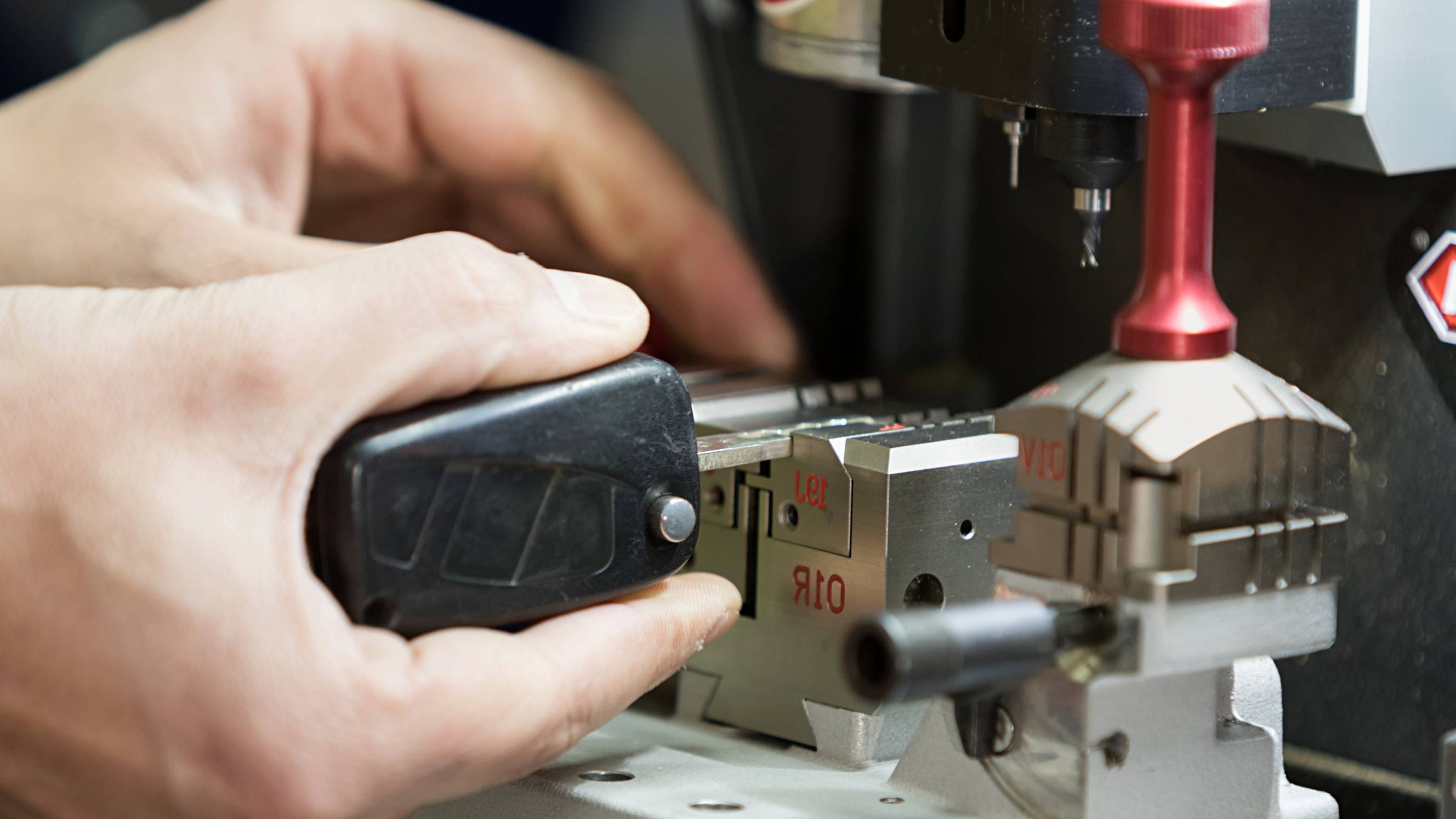 a man making a new car key