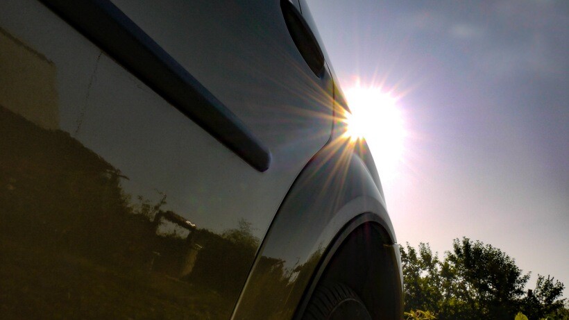 Car wrap vs paint - Sunlight reflecting off a freshly painted car surface