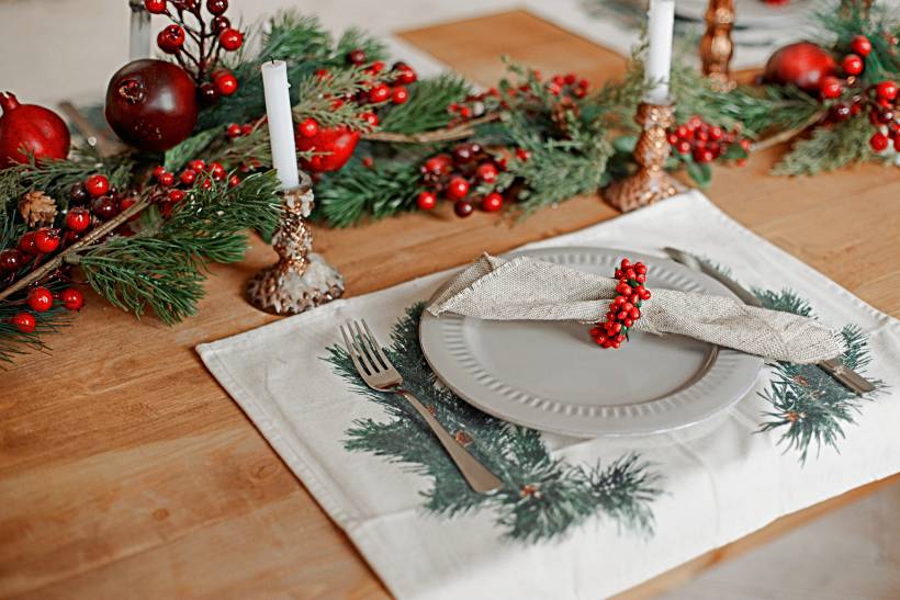 getting ready for the holidays - a beautiful festive table setting for Christmas dinner at home