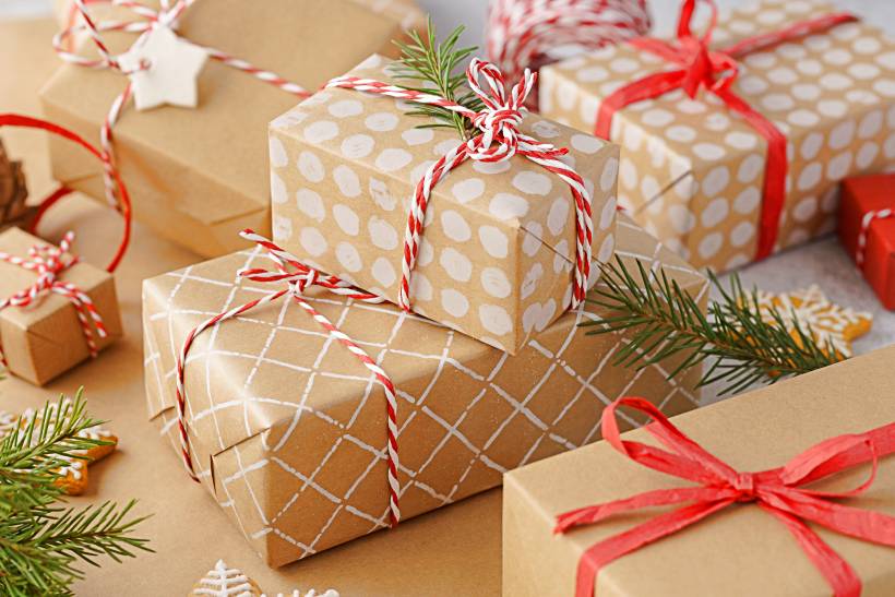 getting ready for the holidays - a stack of handcrafted gift boxes and decoration for Christmas