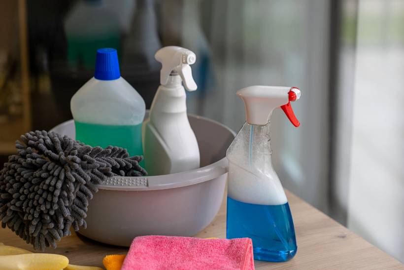 How to stop dust from collecting on desk - cleaning materials on a desk