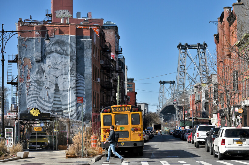 A charming street scene in a Brooklyn neighborhood with brownstone buildings. - moving to NYC