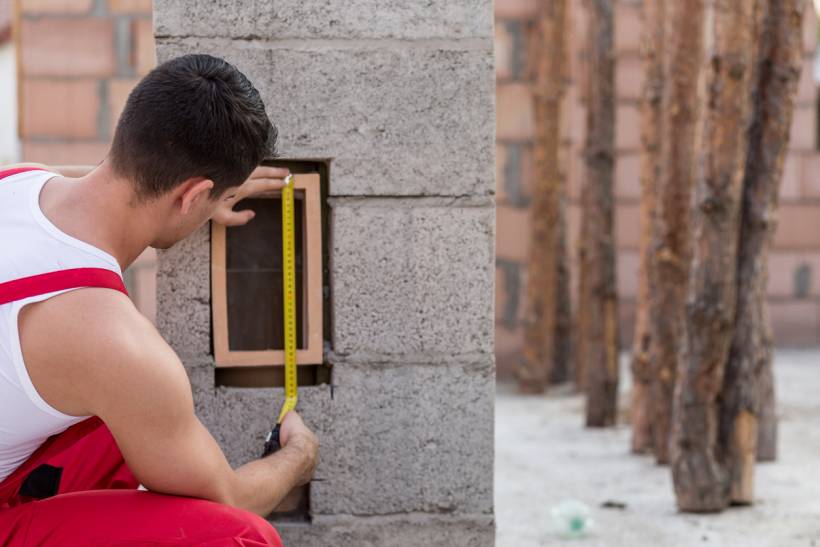 mailbox installation cost - Preparing for mailbox installation by measuring the designated space