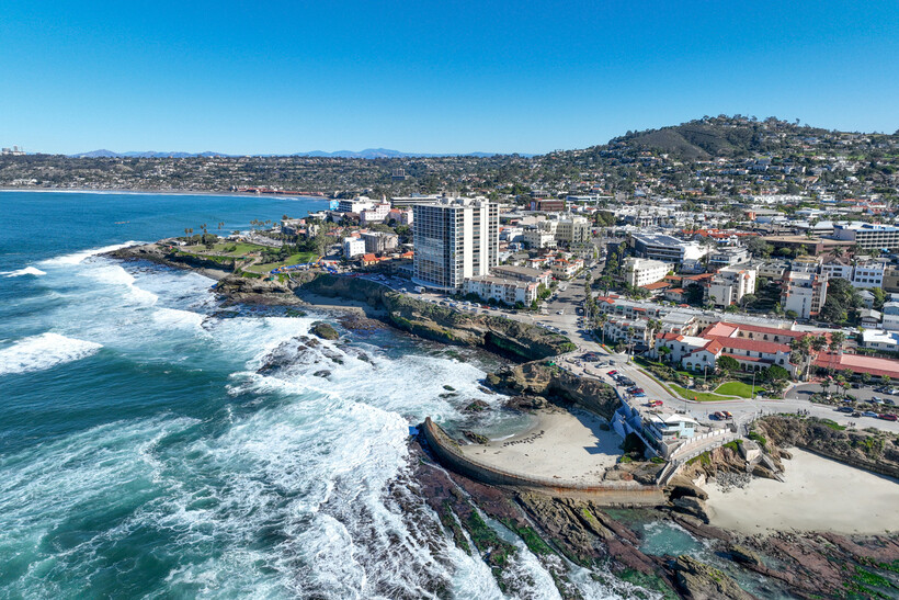 High-angle view of the beautiful beaches and coastal landscape of La Jolla. - moving to San Diego