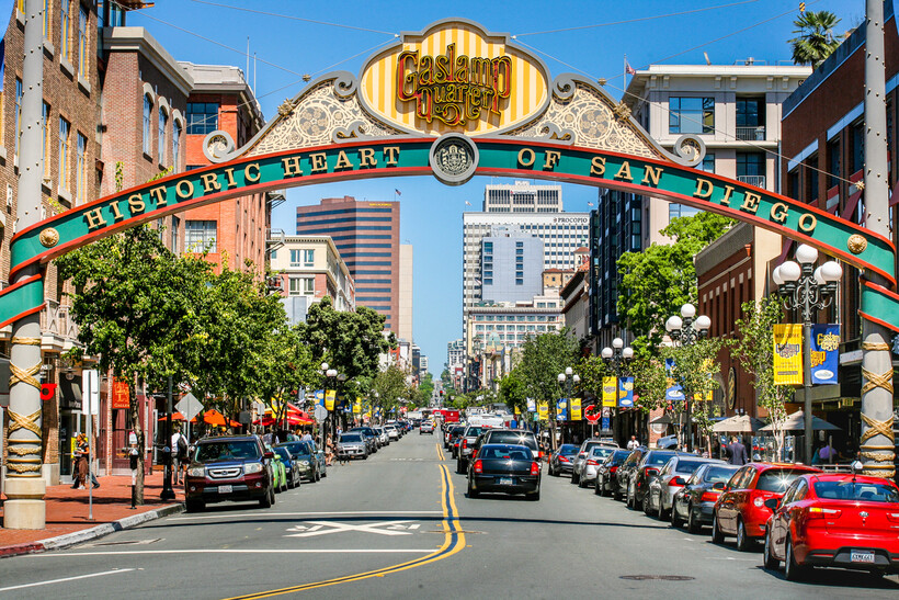A street-level view of the famous Gaslamp Quarter archway in downtown San Diego. - moving to San Diego