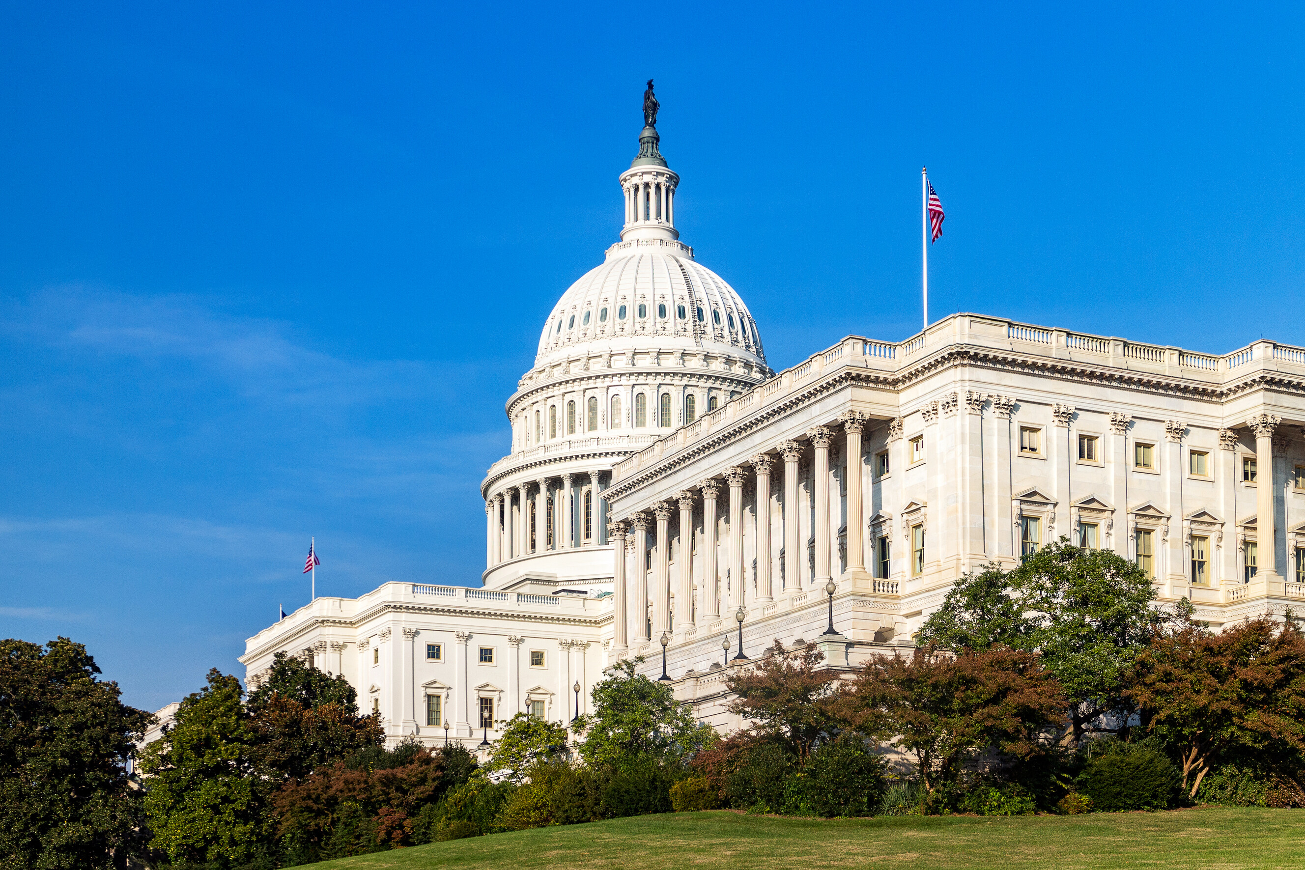 View of the historic United States Capitol building on a clear day in the District.