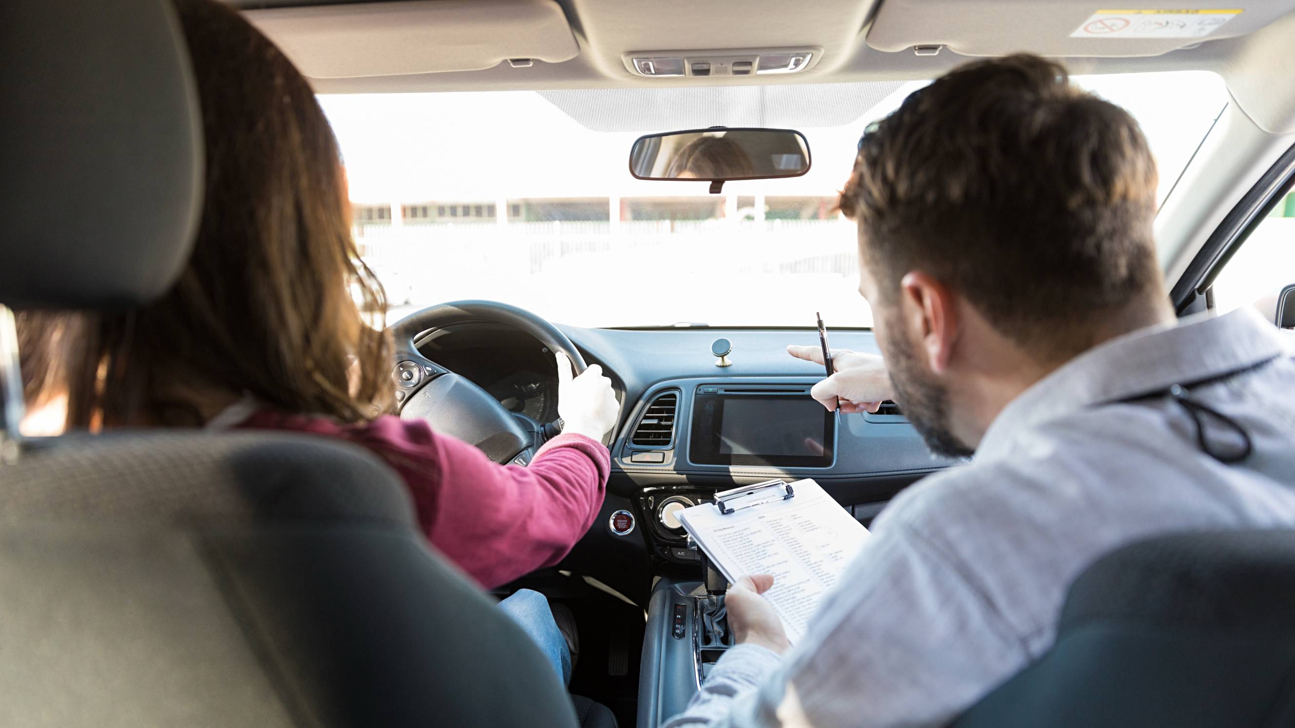 woman having a driving lesson
